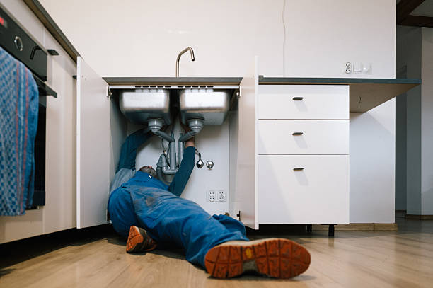 Professional Drain Cleaning technician working in Mount Rainier, MD